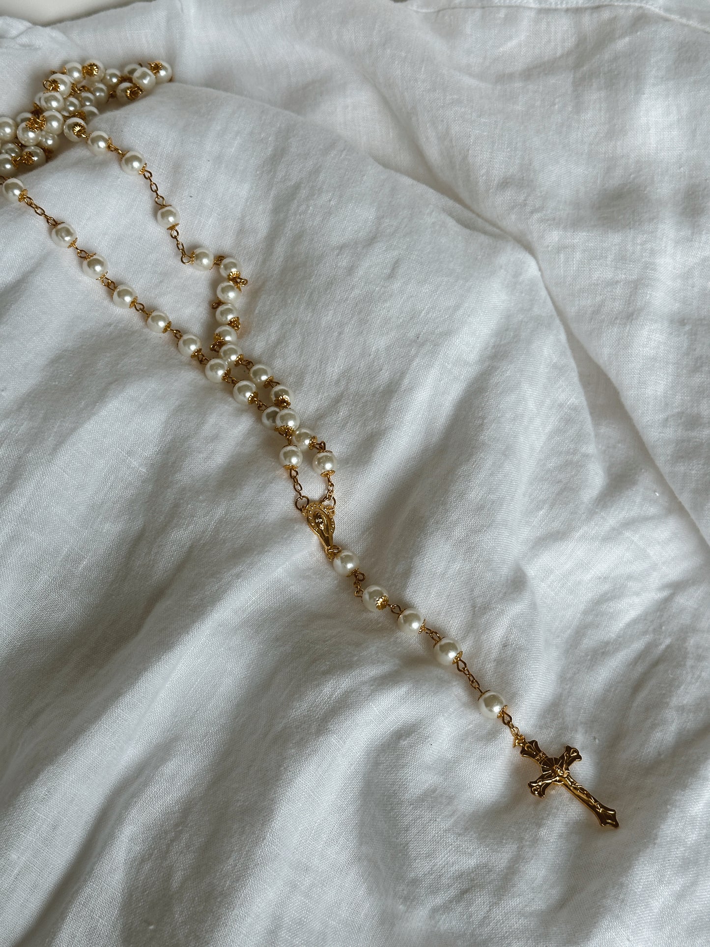 Exquisite Pearl Rosary Beads for Spiritual Reflection