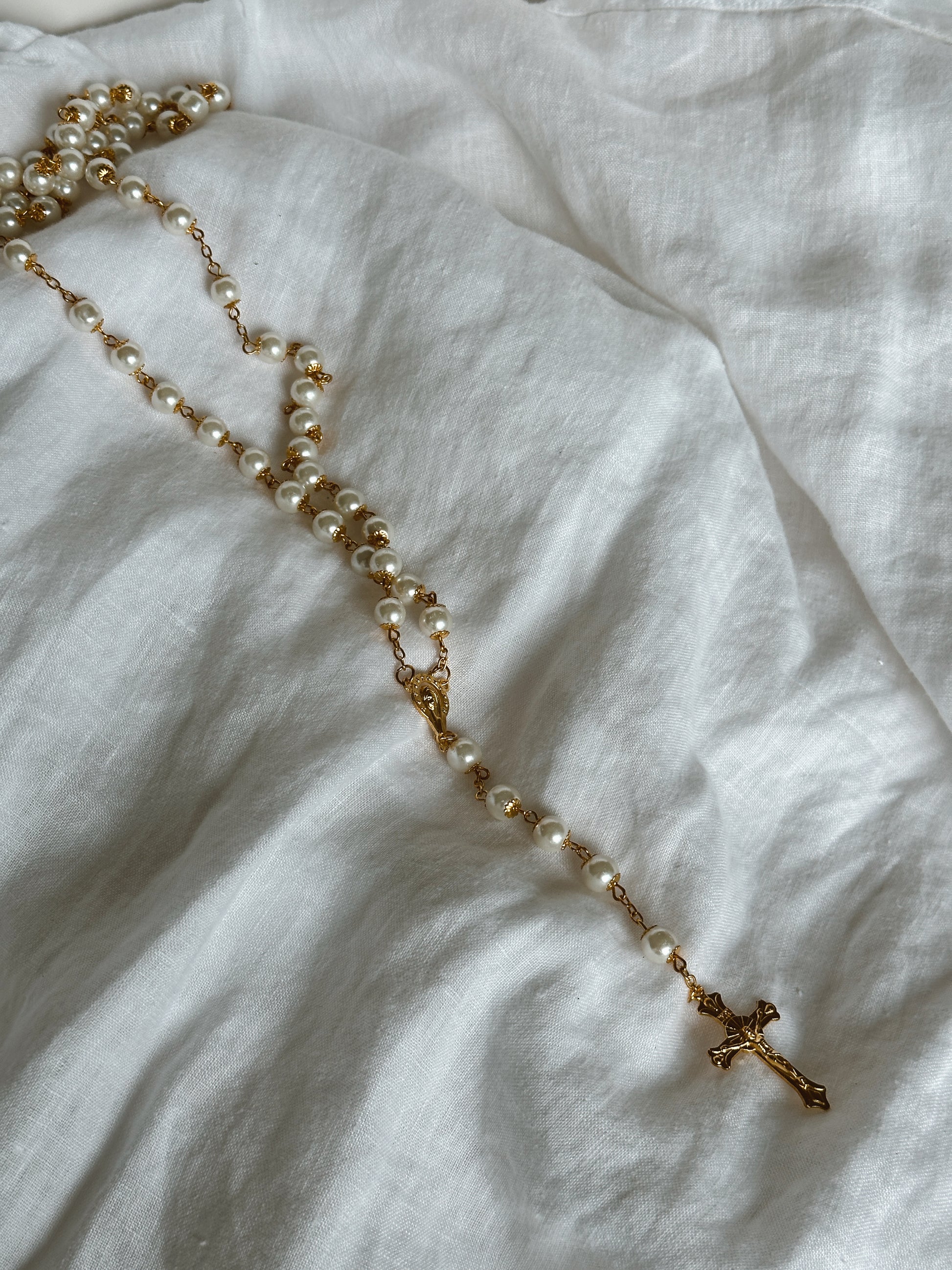 Exquisite Pearl Rosary Beads for Spiritual Reflection